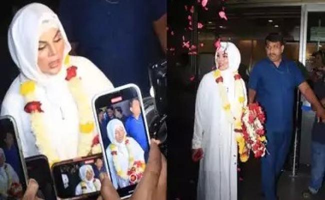 उमरा से लौटीं राखी सावंत का एयरपोर्ट पर फूल बरसाकर स्वागत, हुईं ट्रोल